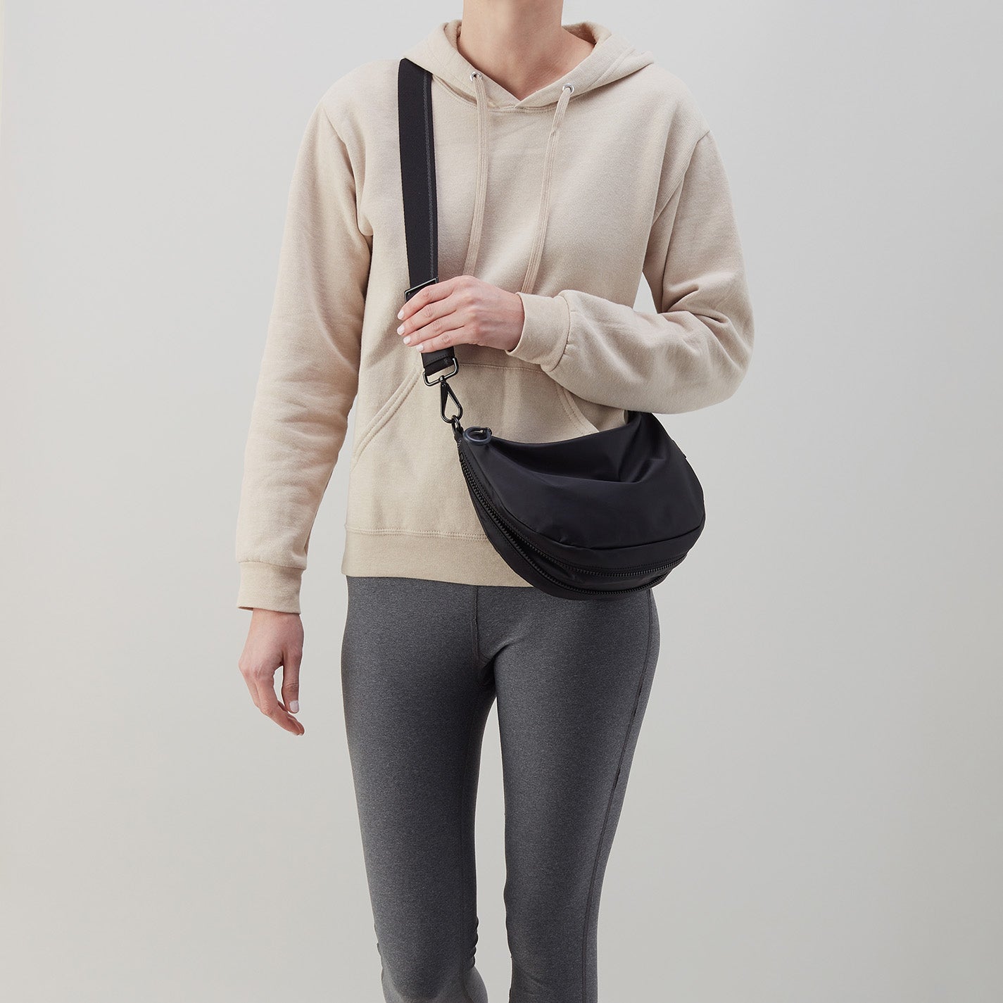 EVERY WEAR Crossbody in CaRefiber recycled nylon - Jet - Image 8